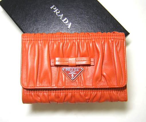Prada nappa bow occasion wallet, orange ( PRADA  Wallet ) 
