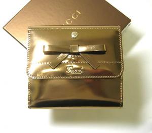  グッチ 二つ折財布大（ゴールド） MainPhoto